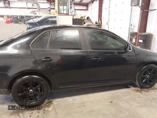2008 Volkswagen Jetta Sedan S with VIN 3VWJM71K78M153658, listed as a IAAI auction lot 41709377 with 144,467 mi miles. Bid and sale history available at carsss.com. Image 13.
