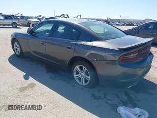 2020 Dodge Charger SXT with VIN 2C3CDXBG0LH117053, listed as a IAAI auction lot 41781124 with 165,590 mi miles and . Bid and sale history available at carsss.com. Image 3.