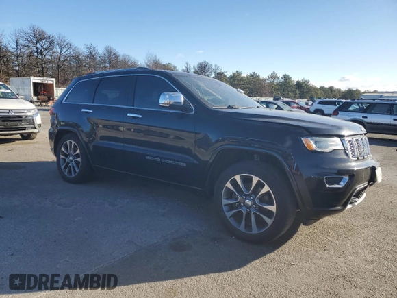 2017 Jeep Grand Cherokee Overland with VIN 1C4RJFCT9HC822898, listed as a Copart auction lot 86567034 with 120,699 mi miles and Salvage Title. Bid and sale history available at carsss.com. Image 4.