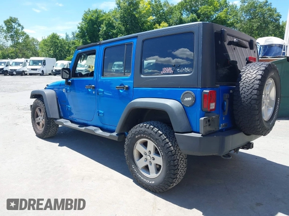 2015 Jeep Wrangler Unlimited Sport with VIN 1C4BJWDG2FL509773, listed as a IAAI auction lot 42753729 with 156,330 mi miles and . Bid and sale history available at DreamBid. Image 3.