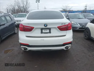 2015 BMW X6 xDrive35i with VIN 5UXKU2C57F0N77194, listed as a IAAI auction lot 41818860 with 105,579 mi miles and . Bid and sale history available at DreamBid. Image 16.