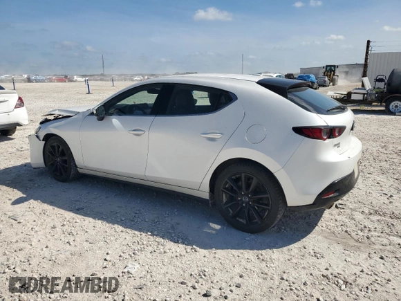 2019 Mazda Mazda3 Hatchback w/Premium Pkg with VIN JM1BPBNM7K1129443, listed as a Copart auction lot 65935074 with 44,567 mi miles and Salvage Title. Bid and sale history available at carsss.com. Image 2.