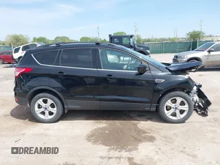 2016 Ford Escape SE z VIN 1FMCU9G97GUA77456, wystawiony jako IAAI lot #42088983 z przebiegiem 160 718 mil mil oraz . Historia ofert i sprzedaży dostępna na DreamBid. Obrazek 14.