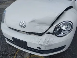 2013 Volkswagen Beetle Convertible 2.5L with VIN 3VW5P7AT9DM825439, listed as a IAAI auction lot 41760907 with 53,649 mi miles. Bid and sale history available at carsss.com. Image 6.