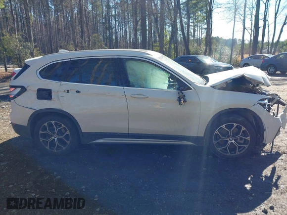 2022 BMW X1 xDrive28i z VIN WBXJG9C04N5V16794, wystawiony jako IAAI lot #41667535 z przebiegiem 55 747 mil mil oraz . Historia ofert i sprzedaży dostępna na DreamBid. Obrazek 13.