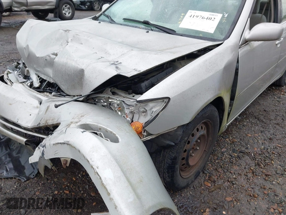 2003 Toyota Camry LE with VIN 4T1BE32K63U755835, listed as a IAAI auction lot 41976402 with 215,788 mi miles and . Bid and sale history available at DreamBid. Image 6.