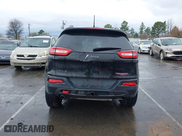 2016 Jeep Cherokee Trailhawk with VIN 1C4PJMBS5GW304062, listed as a IAAI auction lot 41756813 with 112,671 mi miles. Bid and sale history available at carsss.com. Image 17.