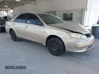 2006 Toyota Camry STD with VIN 4T1BE32K86U737115, listed as a IAAI auction lot 42478597 with 164,939 mi miles and . Bid and sale history available at DreamBid. Image 1.