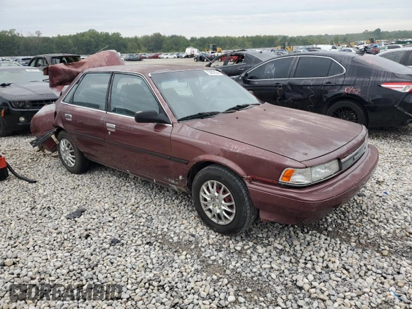 1989 Toyota Camry DLX с VIN 4T1SV21E1KU108151, выставлен на аукционе Copart как лот 73657634 с пробегом 347 186 миль миль и На запчасти • Non repairable. История ставок и продаж доступна на DreamBid. Изображение 4.