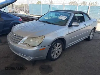 2008 Chrysler Sebring Limited z VIN 1C3LC65M88N268302, wystawiony jako IAAI lot #41882886 z przebiegiem 122 196 mil mil oraz . Historia ofert i sprzedaży dostępna na DreamBid. Obrazek 2.