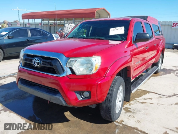 2014 Toyota Tacoma PreRunner with VIN 3TMKU4HN4EM041871, listed as a IAAI auction lot 41641763 with 148,968 mi miles and . Bid and sale history available at DreamBid. Image 18.