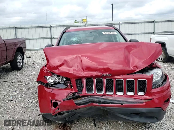2016 Jeep Compass Sport SE with VIN 1C4NJDBB0GD759999, listed as a Copart auction lot 56983255 with 69,548 mi miles and Salvage title. Bid and sale history available at DreamBid. Image 14.