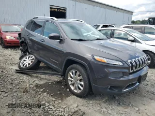 2014 Jeep Cherokee Limited with VIN 1C4PJLDB8EW256206, listed as a Copart auction lot 61712925 with 75,666 mi miles and Salvage title. Bid and sale history available at DreamBid. Image 4.