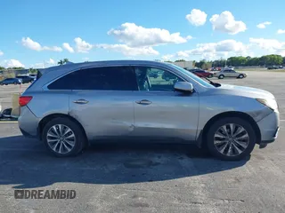 2016 Acura MDX w/Tech with VIN 5FRYD3H46GB004113, listed as a IAAI auction lot 41671704 with 141,476 mi miles. Bid and sale history available at carsss.com. Image 13.