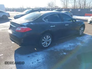 2011 Infiniti M with VIN JN1BY1AR6BM375099, listed as a IAAI auction lot 41451079 with 228,226 mi miles and . Bid and sale history available at carsss.com. Image 4.