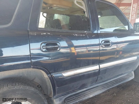 2005 GMC Yukon SLT with VIN 1GKEC13T35J185918, listed as a IAAI auction lot 41025720 with 162,613 mi miles. Bid and sale history available at carsss.com. Image 6.