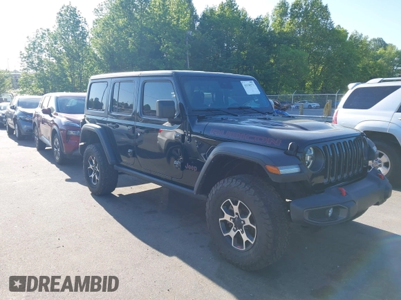 2022 Jeep Wrangler Unlimited Rubicon with VIN 1C4HJXFNXNW149063, listed as a IAAI auction lot 42130171 with 33,961 mi miles and . Bid and sale history available at DreamBid. Image 1.