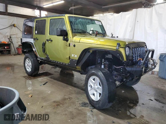 2007 Jeep Wrangler Unlimited X with VIN 1J4GA39187L190061, listed as a Copart auction lot 52420685 with 217,346 mi miles and Salvage Title. Bid and sale history available at DreamBid. Image 4.
