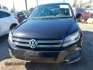 2012 Volkswagen Tiguan LE with VIN WVGAV7AX1CW557250, listed as a IAAI auction lot 42300694 with 122,310 mi miles and . Bid and sale history available at DreamBid. Image 12.