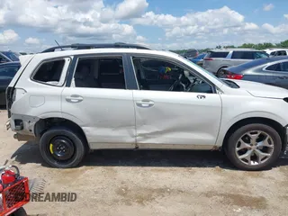2015 Subaru Forester Touring with VIN JF2SJAWC0FH806493, listed as a IAAI auction lot 42355867 with 128,937 mi miles and . Bid and sale history available at DreamBid. Image 14.
