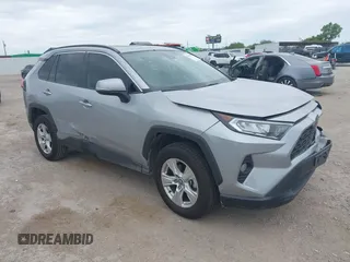 2020 Toyota RAV4 XLE with VIN 2T3W1RFV4LW094687, listed as a IAAI auction lot 42652039 with 56,693 mi miles and . Bid and sale history available at DreamBid. Image 1.
