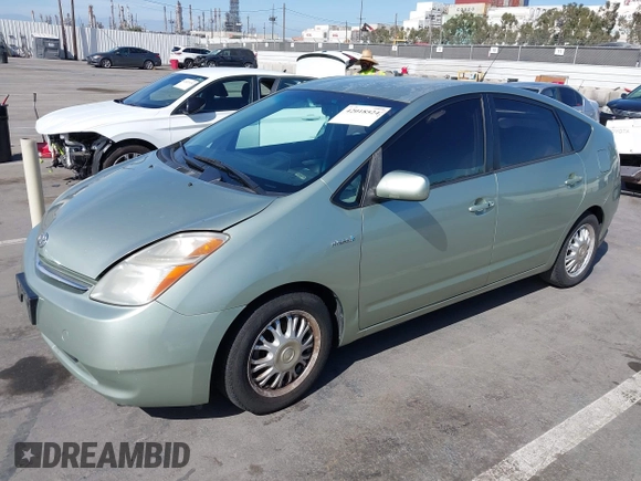 2008 Toyota Prius with VIN JTDKB20U283428437, listed as a IAAI auction lot 42018524 with 124,590 mi miles. Bid and sale history available at carsss.com. Image 2.
