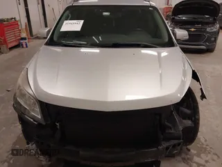 2014 Chevrolet Traverse LT with VIN 1GNKRGKD9EJ149541, listed as a IAAI auction lot 41945942 with 186,531 mi miles. Bid and sale history available at carsss.com. Image 12.