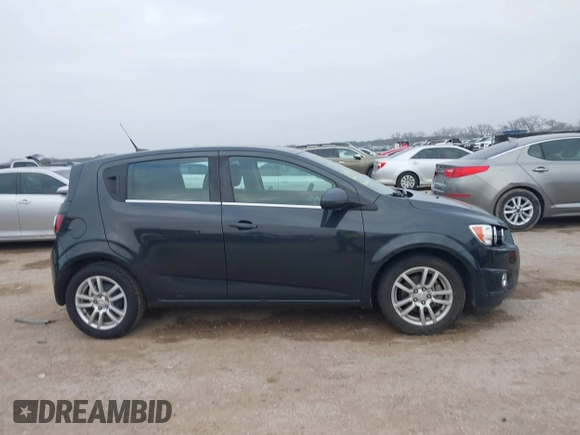 2014 Chevrolet Sonic LT with VIN 1G1JC6SH5E4153094, listed as a IAAI auction lot 41506576 with 118,833 mi miles. Bid and sale history available at carsss.com. Image 13.