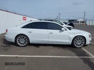 2015 Audi A8 4.0T with VIN WAU32AFD6FN039739, listed as a IAAI auction lot 41946401 with 102,668 mi miles and . Bid and sale history available at DreamBid. Image 13.