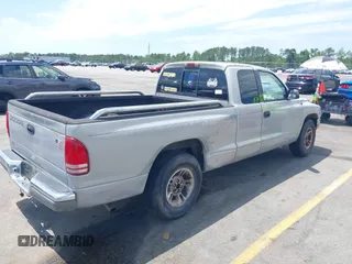 1999 Dodge Dakota SLT z VIN 1B7GL22X9XS258964, wystawiony jako IAAI lot #42309862 z przebiegiem 177 561 mil mil oraz . Historia ofert i sprzedaży dostępna na DreamBid. Obrazek 4.