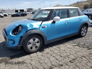 2015 MINI Hardtop 4 Door z VIN WMWXS5C5XFT827473, wystawiony jako Copart lot #58261135 z przebiegiem 75 439 mil mil oraz Szkody całkowita. Historia ofert i sprzedaży dostępna na DreamBid. Obrazek 1.