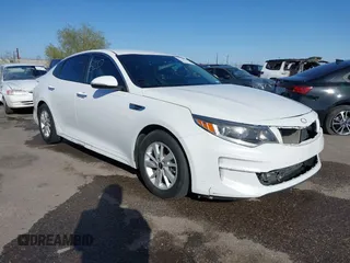 2018 Kia Optima LX with VIN 5XXGT4L32JG181735, listed as a IAAI auction lot 41699217 with 74,822 mi miles. Bid and sale history available at carsss.com. Image 1.