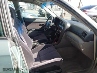2004 Subaru Legacy Wagon (Natl) L with VIN 4S3BH625846303477, listed as a IAAI auction lot 41836308 with 149,236 mi miles. Bid and sale history available at carsss.com. Image 5.