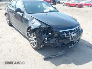 2012 Cadillac CTS Luxury with VIN 1G6DE5E56C0151579, listed as a IAAI auction lot 41717449 with 116,938 mi miles and . Bid and sale history available at DreamBid. Image 6.