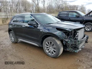 2020 Cadillac XT4 AWD Premium Luxury with VIN 1GYFZDR44LF051848, listed as a Copart auction lot 53104295 with 23,339 mi miles and Salvage Title. Bid and sale history available at DreamBid. Image 4.