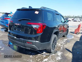 2022 GMC Acadia SLT with VIN 1GKKNMLS5NZ117143, listed as a IAAI auction lot 40665874 with 48,298 mi miles. Bid and sale history available at carsss.com. Image 4.