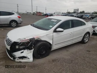 2015 Volkswagen CC R-Line with VIN WVWBN7AN0FE808583, listed as a Copart auction lot 67221683 with 54,048 mi miles. Bid and sale history available at carsss.com. Image 1.