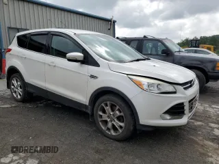 2013 Ford Escape SEL with VIN 1FMCU9HX7DUB22002, listed as a Copart auction lot 60121255 with 157,353 mi miles and Salvage title. Bid and sale history available at DreamBid. Image 4.