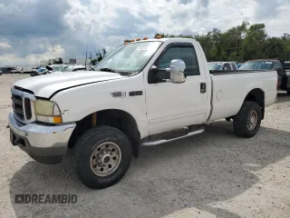2002 Ford F-350 XL with VIN 1FTSF31L42EA65313, listed as a Copart auction lot 74520824 with 155,237 mi miles and Salvage Title. Bid and sale history available at DreamBid. Image 1.