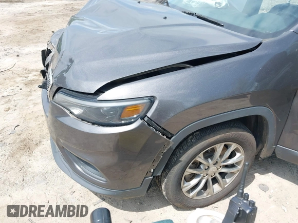 2019 Jeep Cherokee Latitude Plus with VIN 1C4PJLLBXKD305219, listed as a IAAI auction lot 42150283 with 89,000 mi miles and . Bid and sale history available at DreamBid. Image 6.