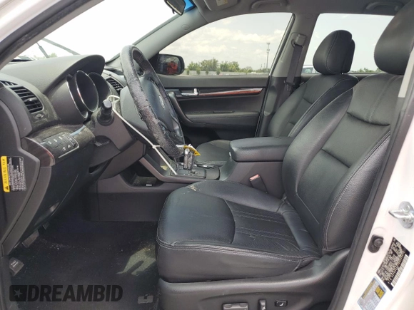 2013 Kia Sorento EX с VIN 5XYKU3A67DG320272, выставлен на аукционе Copart как лот 59878535 с пробегом 118 487 миль миль и Списание • Salvage title. История ставок и продаж доступна на DreamBid. Изображение 7.