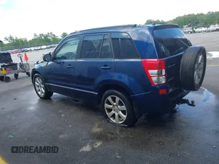 2010 Suzuki Grand Vitara Limited z VIN JS3TE1D9XA4100034, wystawiony jako IAAI lot #42466762 z przebiegiem 189 428 mil mil oraz . Historia ofert i sprzedaży dostępna na DreamBid. Obrazek 3.