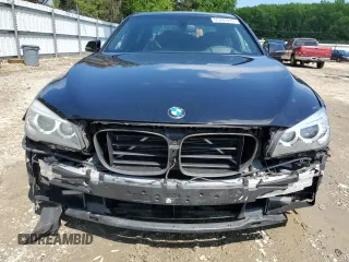 2015 BMW 7 Series 740i z VIN WBAYA6C59FD826788, wystawiony jako Copart lot #55747215 z przebiegiem 134 960 mil mil oraz Szkoda całkowita • Salvage title. Historia ofert i sprzedaży dostępna na DreamBid. Obrazek 5.