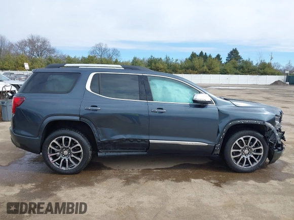 2020 GMC Acadia Denali with VIN 1GKKNXLS8LZ216800, listed as a IAAI auction lot 41822962 with 48,151 mi miles and . Bid and sale history available at DreamBid. Image 14.