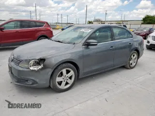 2012 Volkswagen Jetta TDI w/Premium & Nav z VIN 3VWLL7AJ6CM427086, wystawiony jako Copart lot #62194565 z przebiegiem 114 525 mil mil oraz Czysty tytuł • Clean title. Historia ofert i sprzedaży dostępna na DreamBid. Obrazek 1.