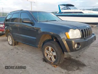 2006 Jeep Grand Cherokee Laredo with VIN 1J4GR48K06C163251, listed as a IAAI auction lot 41103169 with 186,346 mi miles. Bid and sale history available at carsss.com. Image 1.