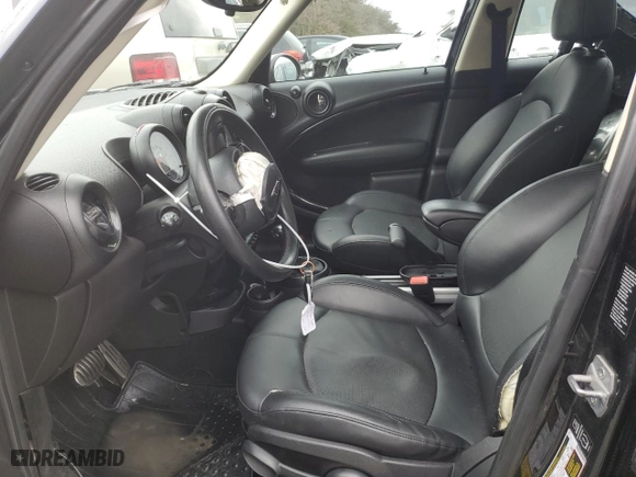 2014 MINI Cooper Countryman S with VIN WMWZC3C51EWP25860, listed as a Copart auction lot 47460235 with 128,314 mi miles and Salvage Title. Bid and sale history available at carsss.com. Image 7.