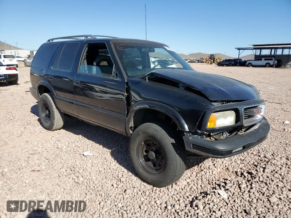 1997 GMC Jimmy SLS with VIN 1GKDT13W8V2560329, listed as a Copart auction lot 80992204 with 231,051 mi miles and Salvage Title. Bid and sale history available at carsss.com. Image 4.