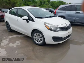 2015 Kia Rio LX with VIN KNADM4A32F6455571, listed as a IAAI auction lot 41970565 with 92,005 mi miles. Bid and sale history available at carsss.com. Image 1.