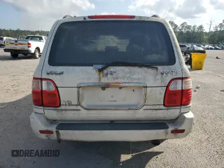 2002 Lexus LX 470 z VIN JTJHT00W623517039, wystawiony jako Copart lot #51458785 z przebiegiem 219 906 mil mil oraz Tytuł czysty. Historia ofert i sprzedaży dostępna na DreamBid. Obrazek 6.